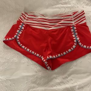Lulu lemon size 6 red and white athletic shorts 2.5 inch inseam and 9 inch rise
